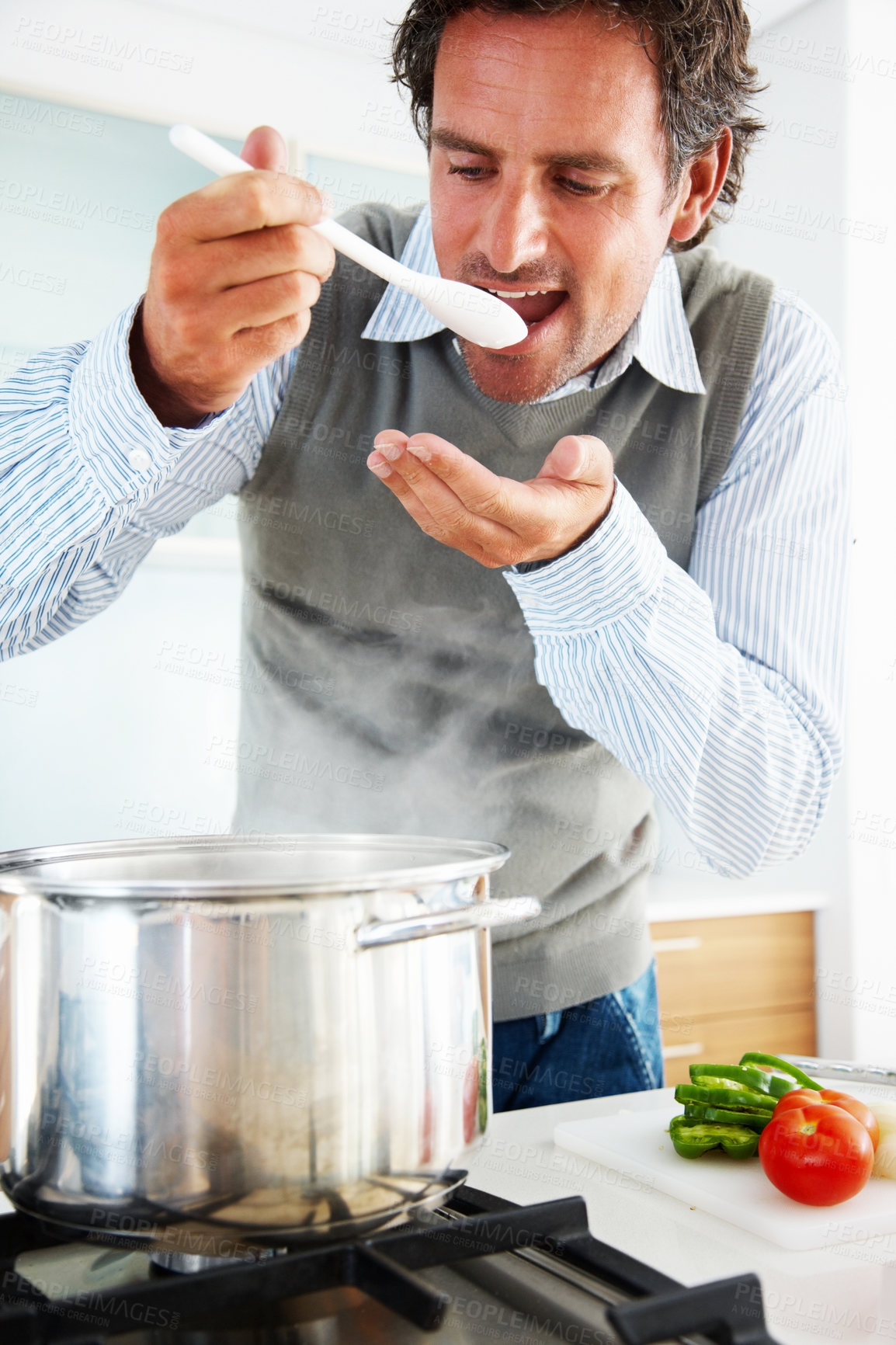 Buy stock photo Man, pot and tasting in kitchen at house for healthy food, lunch and cooking dinner with vegetables. Chef, oven and happy in home for breakfast, eating and wellness with diet nutrition and protein