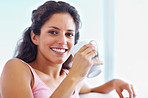 Young woman having a cup of coffee