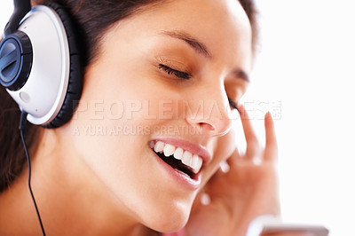 Buy stock photo Music headphones, singing and woman face listening to playlist track, audio podcast or wellness sound. Freedom, eyes closed and closeup girl, student or singer streaming media, song or radio app