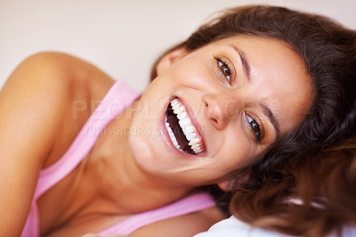 Buy stock photo Portrait, wake up and happy woman in bed with a smile, confidence and positive attitude in her home. Morning, face and female person with energy, good mood or excited for weekend or laugh in bedroom