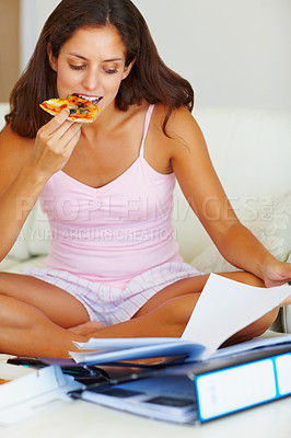 Buy stock photo Studying, eating and woman on bed with pizza for dinner, lunch or supper reading documents. Paperwork, textbook and young female student enjoying fast food and preparing for test, exam or assignment.