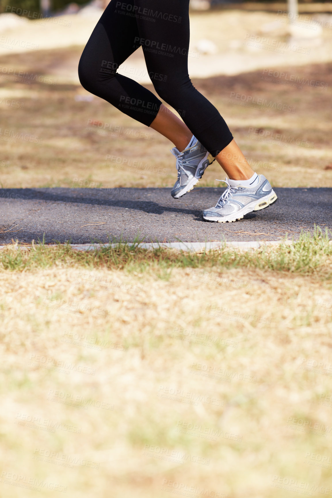 Buy stock photo Running, workout and shoes of woman in nature for fitness, speed and cardio challenge. Wellness, sports and health with female runner training in outdoor path for exercise, fast and performance