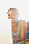 Woman using laptop outdoors