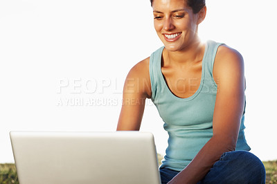 Buy stock photo Typing, happy and woman on ground with laptop for internet research, scholarship and exam studying with mockup. Computer, smile and student girl outdoor with online class for education and knowledge