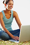 Smiling girl using laptop