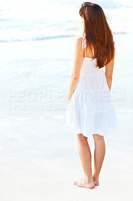 Buy stock photo Back view, beach or woman on vacation to relax on outdoor holiday for break or paradise in Ibiza. Tourist, girl or female person on sand alone at ocean, nature or sea with peace, wellness or travel