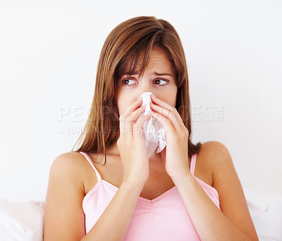 Buy stock photo Sick, woman and nose with tissue in bed at home for medical problem, bacteria and viral infection. Female person, illness and thinking with health issue in apartment for allergy, covid virus or germs