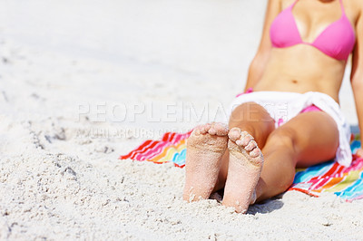 Buy stock photo Woman, feet and bikini at beach, relax and sand for sunshine, summer and mockup space with towel. Girl, freedom and outdoor for vacation, holiday or color for sunbathing, health or wellness in Naples