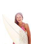 Happy young woman smiling with a surfboard