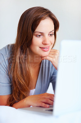 Buy stock photo Home, woman and thinking with a laptop, typing and happiness with mockup space, relax and network. Person, apartment and girl with a pc, peaceful or planning with problem solving, idea or digital app