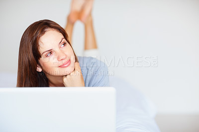 Buy stock photo Home, woman and thinking with a laptop, ideas and happiness with mockup space, relax and network. Person, apartment and girl with a pc, peaceful and planning with problem solving, calm or digital app