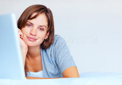 Buy stock photo Home, portrait and woman with a laptop, relax and connection with mockup space, network and smile. Face, person and girl with computer, internet or website information with a break, pc and technology