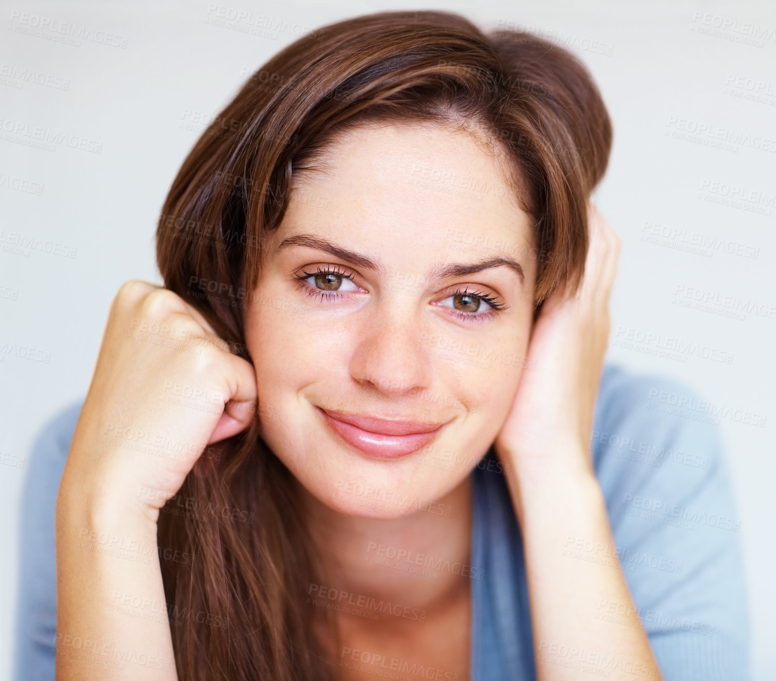 Buy stock photo Relax, smile and portrait of woman lying in home with natural beauty, peace or calm on white background. Wake up, morning and happy girl with hands on face, health and wellness with positive attitude