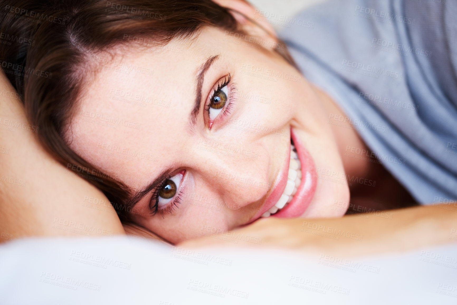 Buy stock photo Relax, smile and portrait of woman on bed for sleeping, dreaming and comfortable at home. Happy, cozy and face of person in bedroom resting, nap and wake up for health, wellness and calm in morning