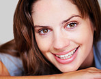 Closeup of a pretty young woman smiling