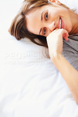 Buy stock photo Relax, blanket and portrait of happy woman on bed for sleeping, dreaming and comfortable. Smile, home and face of person in bedroom resting, nap and wake up for health, wellness and calm in morning