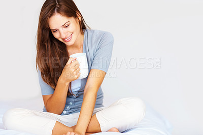 Buy stock photo Morning, home and woman in bedroom with coffee for relaxing, calm and aroma on weekend. House, white background and happy person smile with mug for warm beverage, tea and drinking caffeine in bedroom