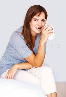 Buy stock photo Happy, coffee and portrait of woman in home for relaxing, calm and breakfast on weekend. House, apartment and person smile with mug for warm beverage, tea and drinking caffeine in bedroom in morning