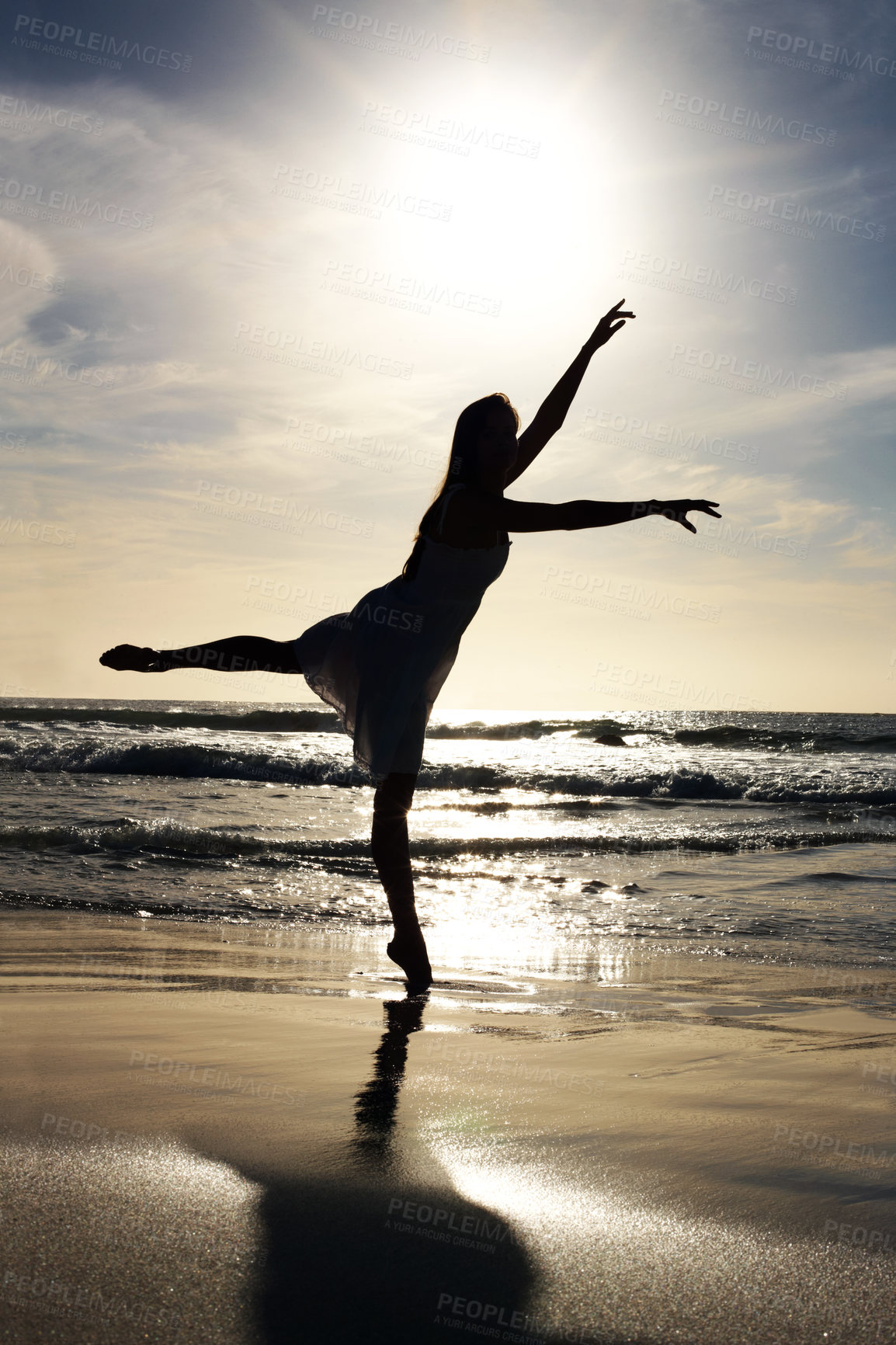 Buy stock photo Portrait of a cute young female dancing on the sea shore - Outdoor