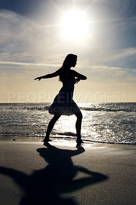 Buy stock photo Portrait of a young woman dancing on the sea shore - Outdoor