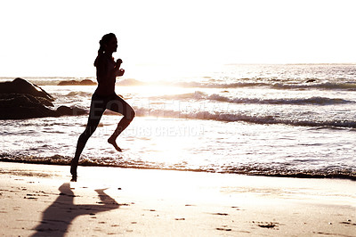 Buy stock photo Silhouette, woman and sunset with ocean for runner with fitness or outdoor training in nature with cardio. Scenic, health and sand on beach coast for workout with travel, sky and sports athlete