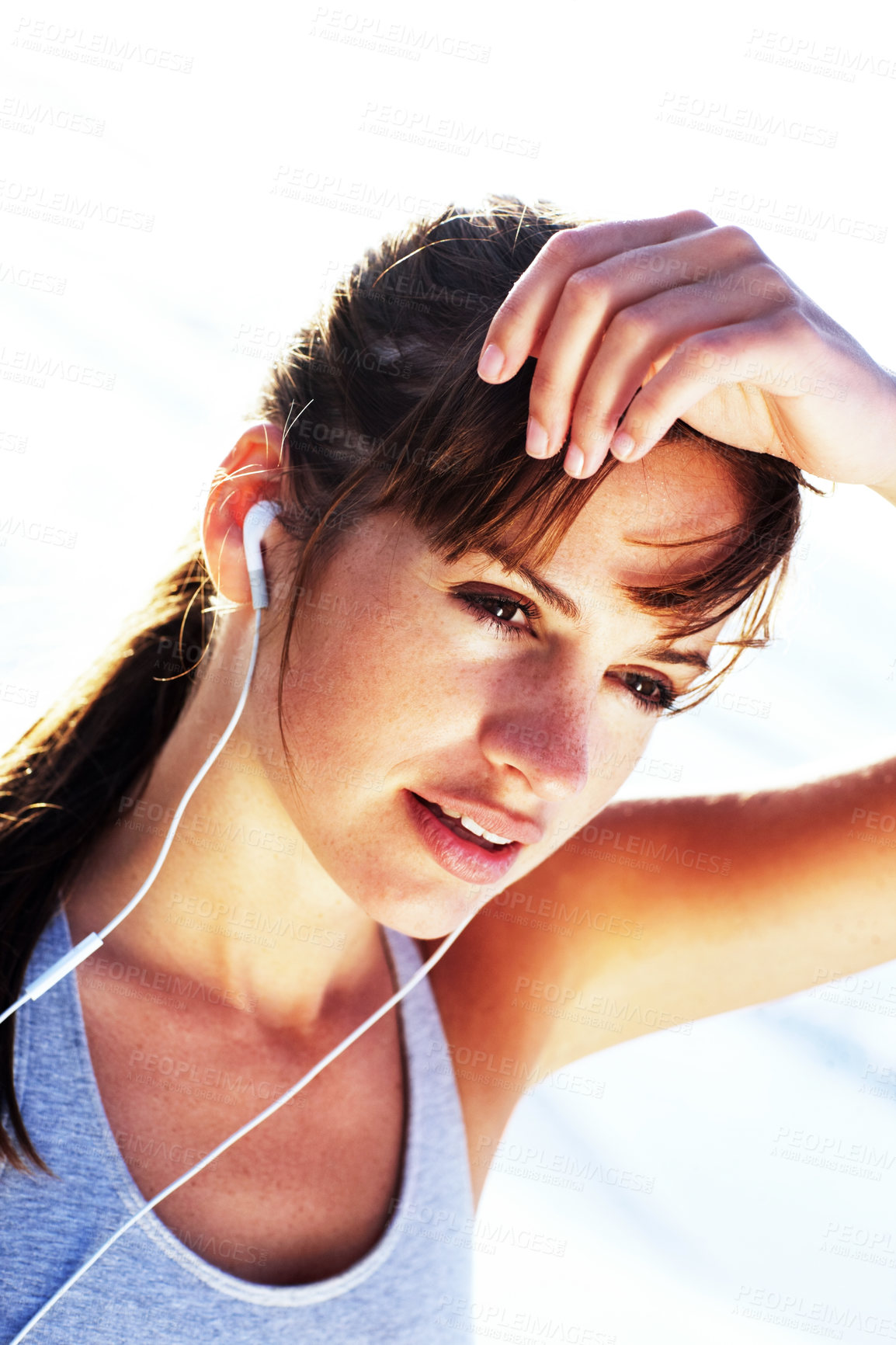 Buy stock photo Tired, music and sports woman outdoor for thinking, workout and marathon training. Fatigue, fitness or runner resting on break for listening to radio, audio sound or relax with earphones for wellness