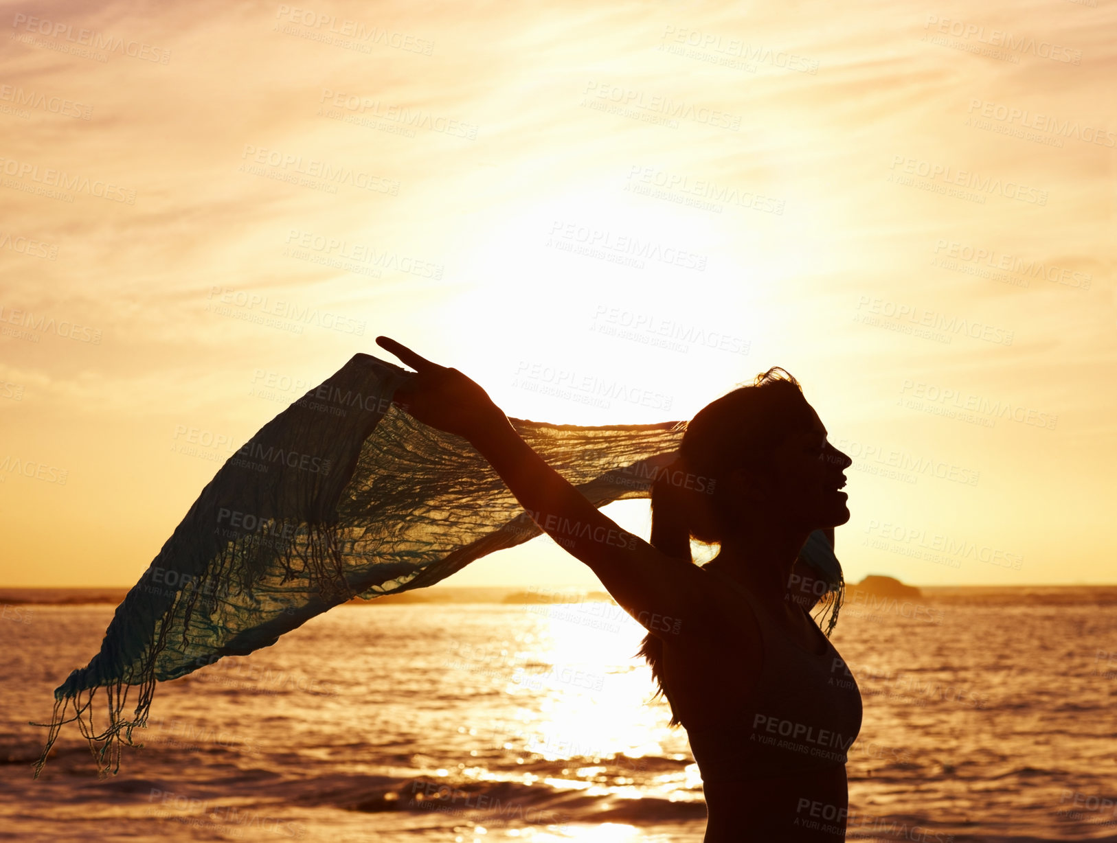 Buy stock photo Silhouette, freedom and woman on beach for vacation, holiday and adventure in Puerto Rico. Scenic view, sunset and girl with shawl for peace, relax and summer break in ocean for wellness and tranquil