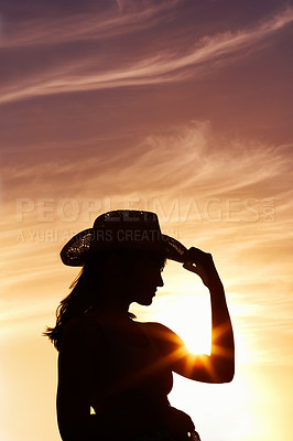 Buy stock photo Silhouette, hat and girl by sunset outdoor for vacation, holiday and adventure in Puerto Rico. Scenic view, travel and woman by orange sky for peace, relax and summer break in nature for wellness