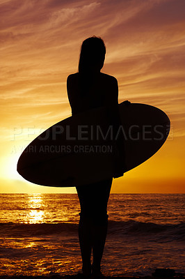 Buy stock photo Woman, surfboard and silhouette for sunset or nature, ocean or water sports or surfing. Summer, waves and beach for sunlight for female person, vacation or travel for exercise or health and wellness 