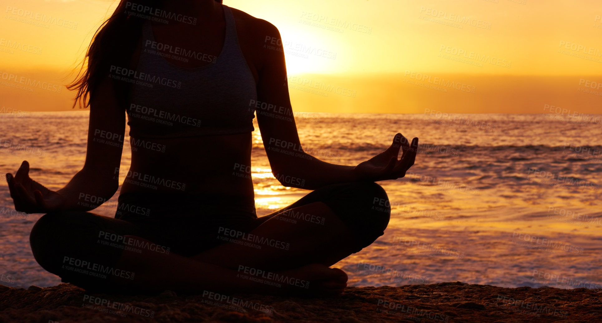 Buy stock photo Silhouette, sunset and woman in lotus pose with yoga on the beach, orange sky and meditation outdoor. Healing, wellness and peace in nature with shadow, female yogi back and meditate by the ocean