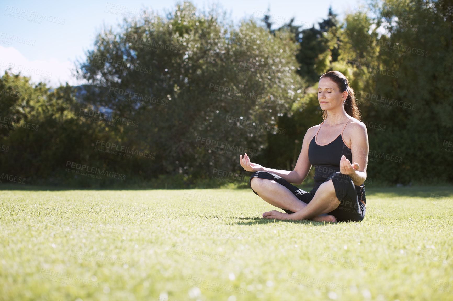 Buy stock photo Woman, exercise or yoga outdoor in backyard for wellness, peace and health training lotus pose for balance. Female person, meditation and calm outside for pilates, relax or padmasana practice