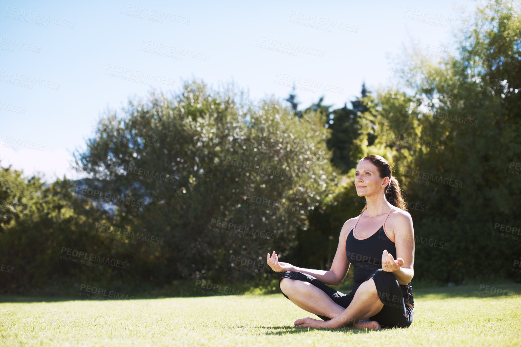 Buy stock photo Woman, exercise or yoga outdoor in backyard for wellness, peace and health training lotus pose for balance. Female person, meditation and calm outside for pilates, relax or padmasana practice