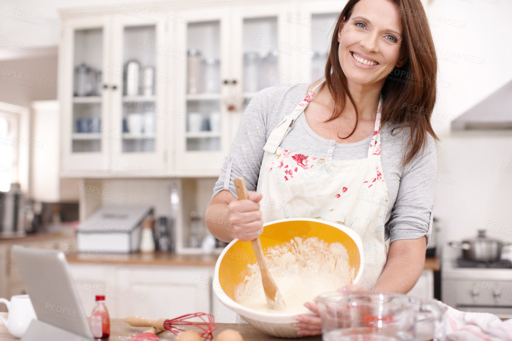 Buy stock photo Baking, woman and portrait with smile in kitchen for sweet dessert, cookies or cupcakes in home. Baker, flour and happy female person with bowl for mixing ingredients, recipe or cake on Easter