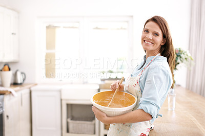 Buy stock photo Woman, portrait and baking by mixing batter in kitchen with ingredients as baker for dessert process. Smile, female person and whisking food for cooking cake as chef for hospitality at house