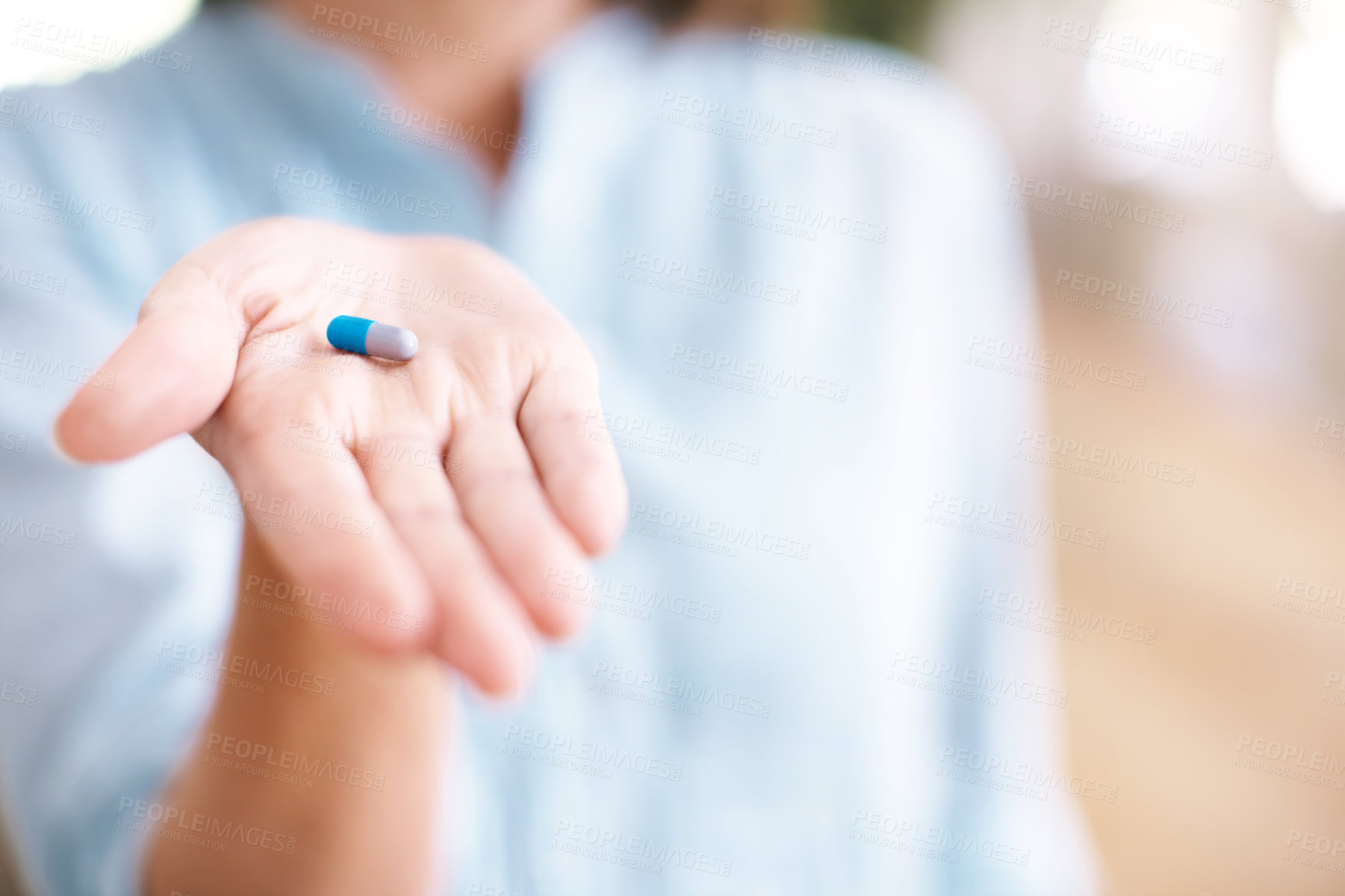 Buy stock photo Palm, pill and medicine in home closeup for healthcare, wellness or diet supplement for nutrition benefits. Person, capsule and hand with drugs, vitamin c or medical probiotics prescription treatment