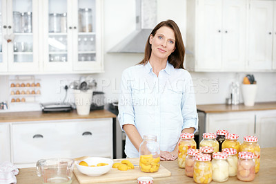 Buy stock photo Mature woman, portrait and jar with healthy preserved peaches and fermented food for diet. Housekeeping, home economics for harvest and preservation, pickled and marinated vegetables or fruit compote