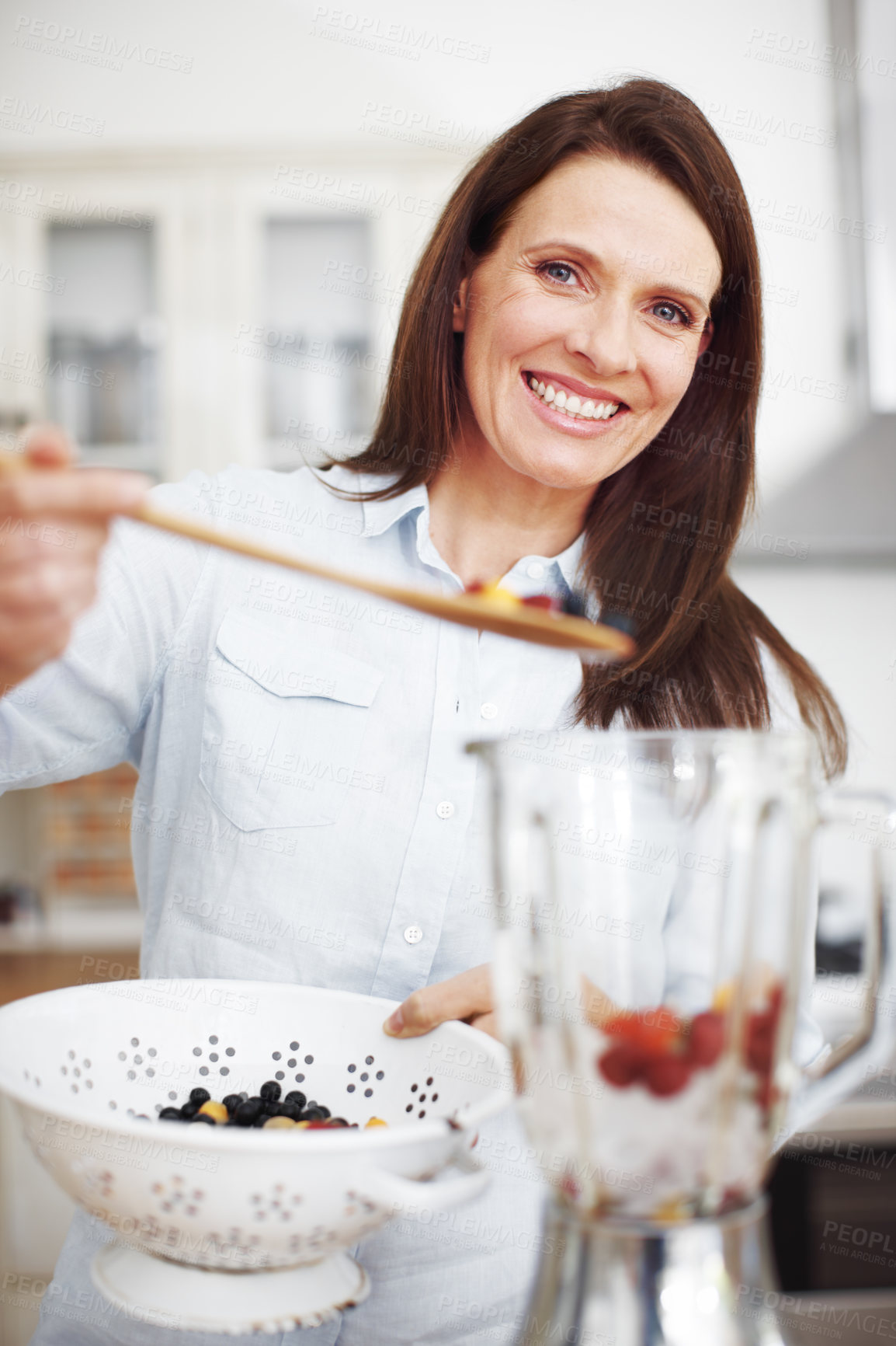 Buy stock photo Blender, kitchen portrait and woman with fruit for smoothie, healthy food, vegan diet and nutrition. Smile, female person and appliance for berry drink with protein, energy and organic breakfast