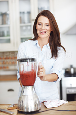 Buy stock photo Woman, happy and blender in kitchen for smoothie or shake, handmade and fresh recipe for breakfast detox diet. Girl, strawberry and beverage for meal alternative, vitamin boost and natural nutrition.