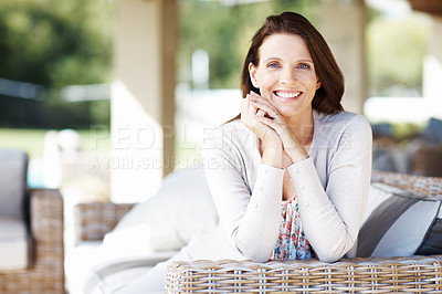 Buy stock photo An attractive brunette having a relaxing time outdoors