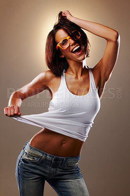 Buy stock photo Fashion, dance and woman with sunglasses in studio with trendy clothes, style and casual outfit. Excited dancer, happy and confident person with movement, performance and freedom on gray background
