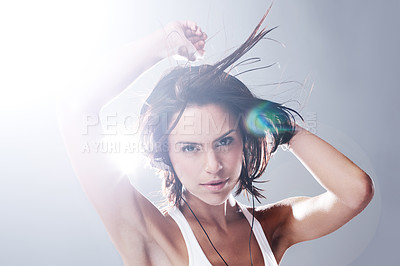 Buy stock photo Serious, woman and portrait with music, audio and online radio with confidence in studio. White background, female person and headphones with dancing and playlist with freedom and listening to sound