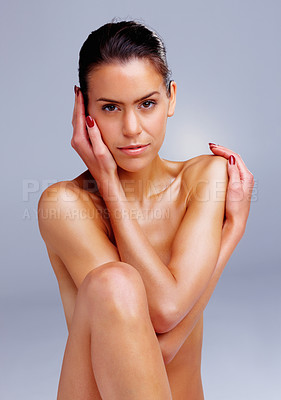 Buy stock photo Portrait of a sensuous naked woman isolated against colored background