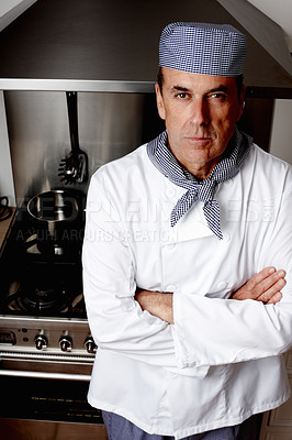 Buy stock photo Portrait, chef and man with arms crossed for cooking, career or job in restaurant. Face, confidence and professional in kitchen for catering service, hospitality and pride of person working in Spain