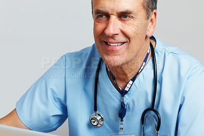 Buy stock photo Closeup portrait of a senior doctor with stethoscope against white background