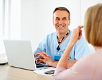 Female patient in consultation with a male doctor at clinic