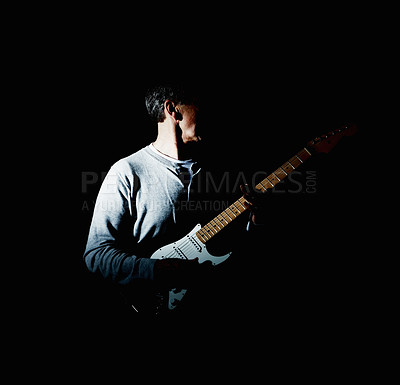 Buy stock photo Dark, man or guitar in studio performance for jazz music, artist or concert on black background. Creative person, hidden or musician playing electrical instrument in shadow with song, mockup or space