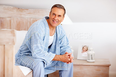 Buy stock photo Smile, portrait or senior man on bed for wellness, weekend relax or happy at home. Retirement success, elderly person or calm in morning for financial security, good health or peace in Canada