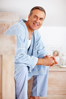 Buy stock photo Smile, thinking and senior man on bed for rest, weekend relax and happy in dream home. Retirement success, elderly person and calm in morning for financial security, good health and peace in Canada