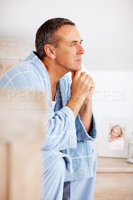 Buy stock photo Thinking, ideas and mature man in bedroom at nursing home for dementia symptoms with treatment. Illness, memory loss and senior male person with reflection for past relax on bed at house in Australia