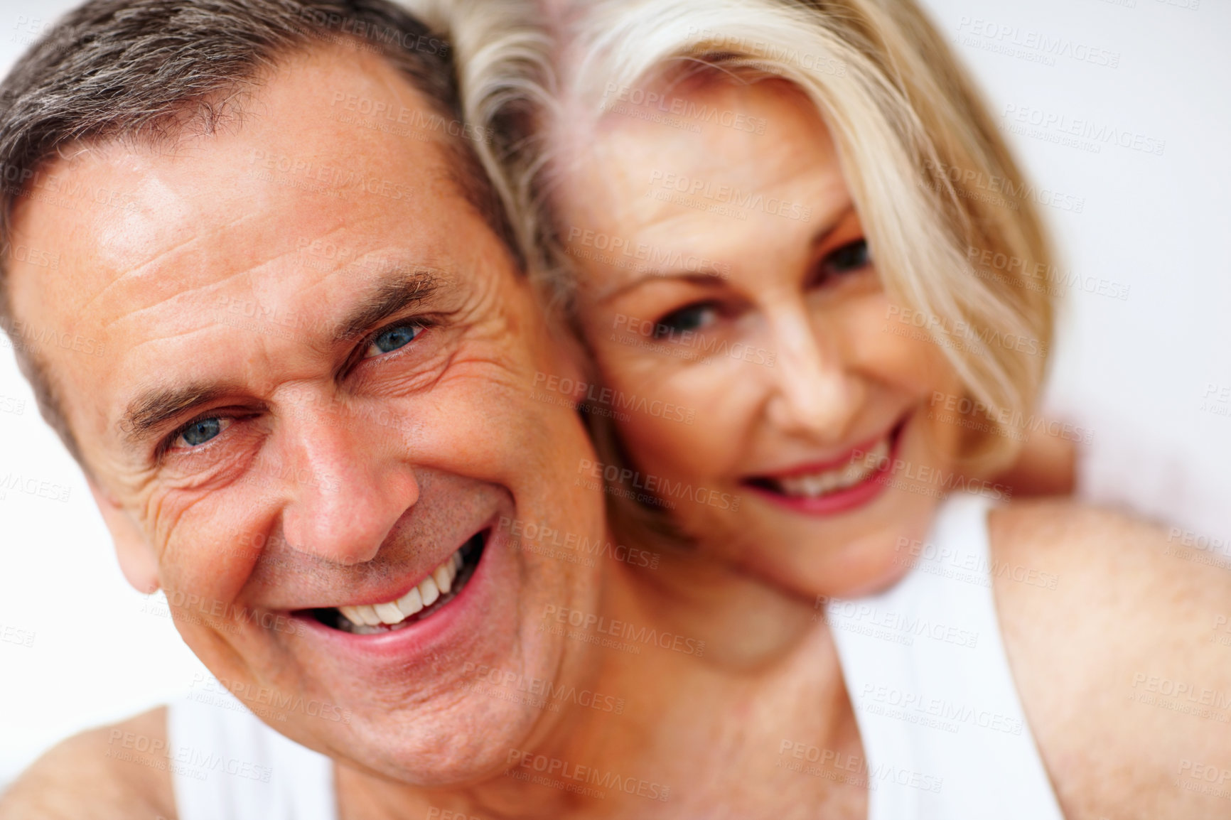 Buy stock photo Happy portrait, mature couple and hug for healthy relationship, bonding and support with care in home. Face smile, woman and man with love embrace for safety, calm weekend and marriage commitment